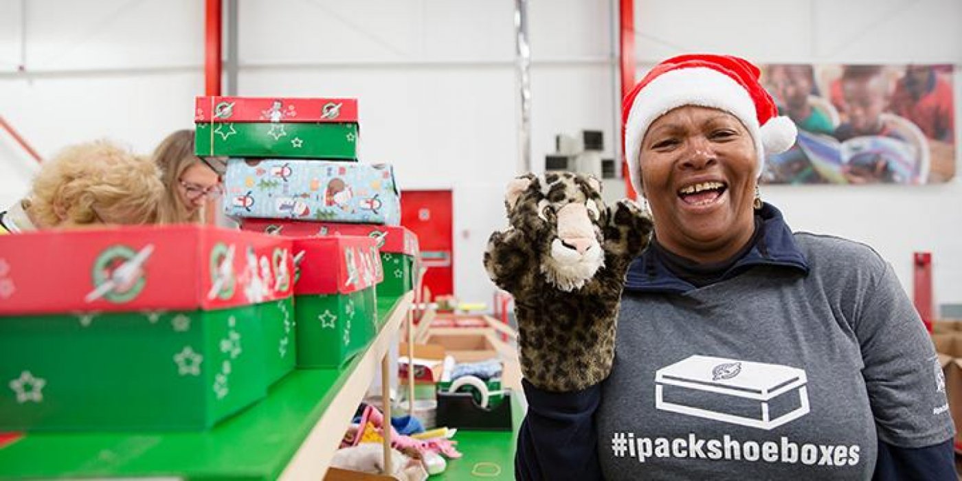 Volunteer processing of gifts with Operation Christmas Child